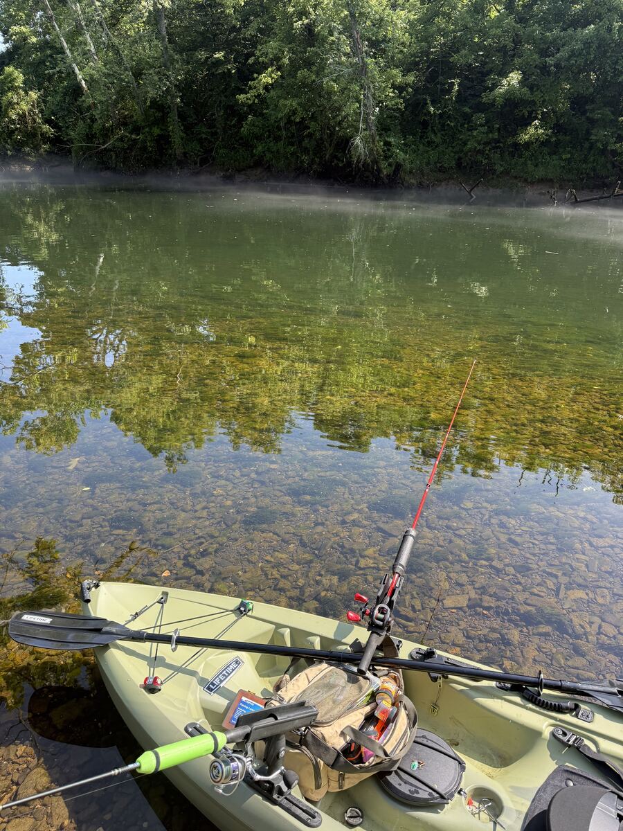 Kayak resting in the clear shallow water of Dale Hollow Lake